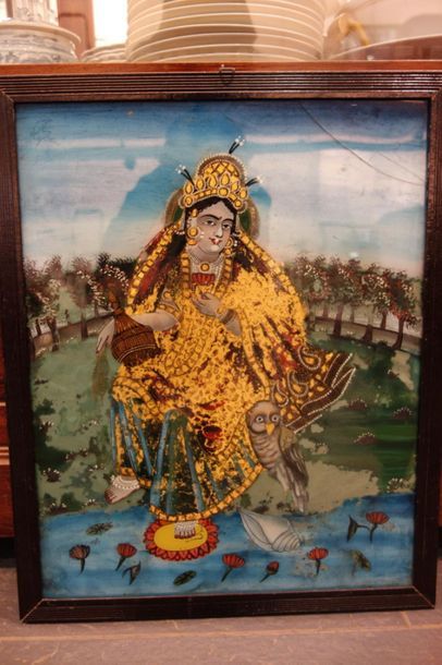 Fixé sous verre indien à décor d'une divinité...