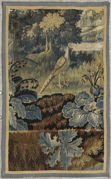 Partie d'une verdure en tapisserie à décor...