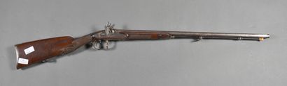Side-action shotgun with 2 juxtaposed barrels...