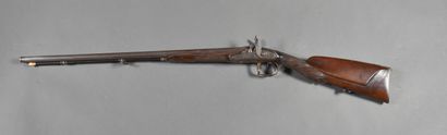 Side-action shotgun with 2 juxtaposed barrels...