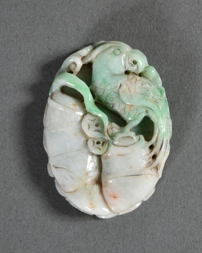 Two jade objects, one in white jadeite veined...