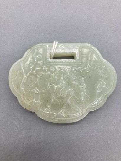 Two jade objects, one in white jadeite veined...
