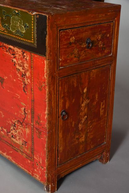 Rectangular piece of furniture, in red lacquered...
