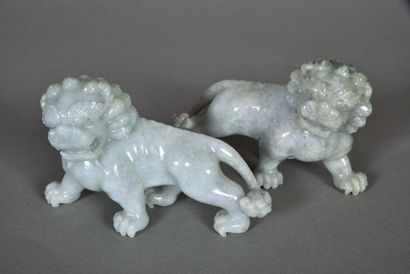Pair of grey jadeite lions shaded with white...