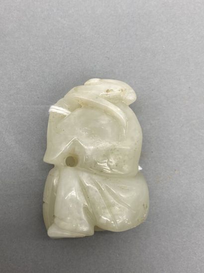 Two celadon jade subjects representing children,...