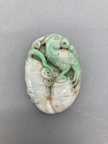 Two jade objects, one in white jadeite veined...
