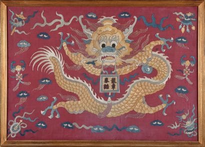 Red silk panel embroidered in polychrome...