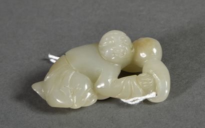 Two celadon jade subjects representing children,...