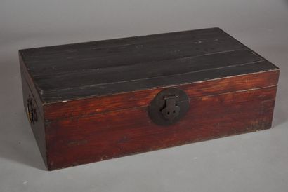 Wooden trunk with mahogany patina on the...