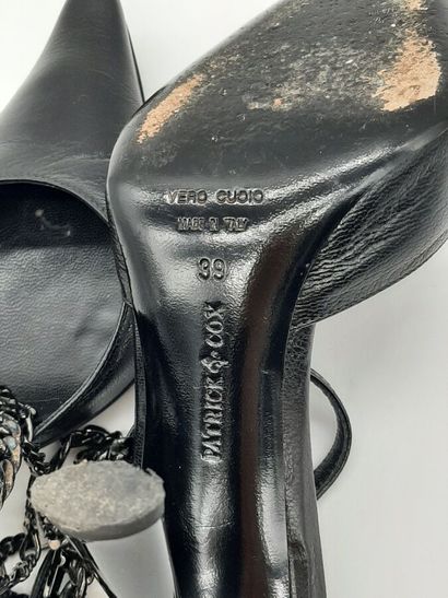 PATRICK COX. Pair of black leather pumps,...
