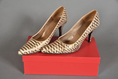 CHARLES JOURDAN. Pair of copper pumps, reptile...