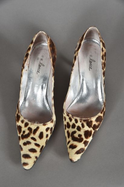 FREE LANCE. Pair of leopard pointy toe pumps,...