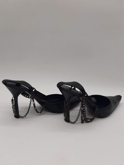 PATRICK COX. Pair of black leather pumps,...