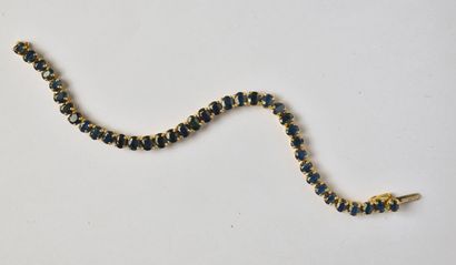 *18K (750/oo) gold line bracelet of 2 tones...