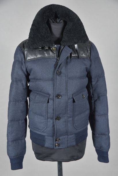 BURBERRY. Blue quilted jacket with black...