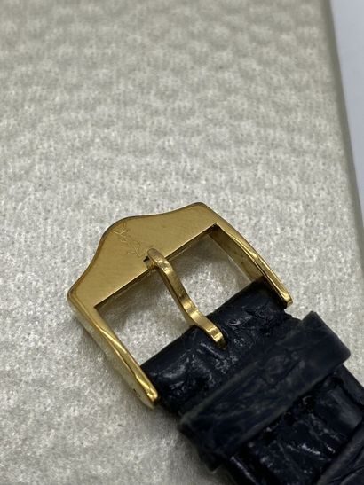 YVES SAINT LAURENT. Watch with square dial...