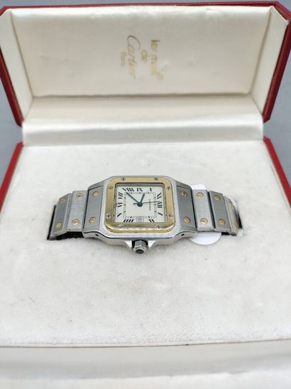 CARTIER : Montre en acier et or jaune 18K...