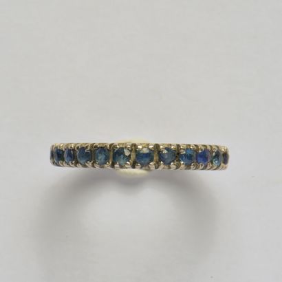 *Silver wedding band (800/oo) decorated with...