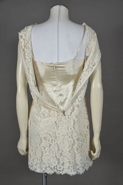 DOLCE & GABBANA. Ivory lace mini dress without...