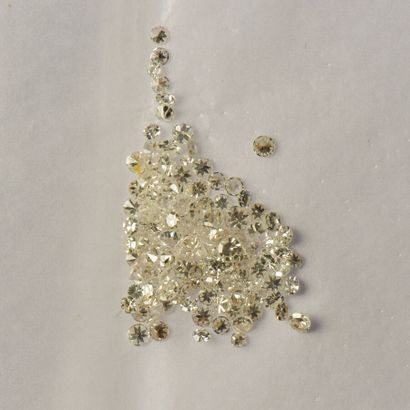 Lot of round diamonds, mostly 8x8, on paper...