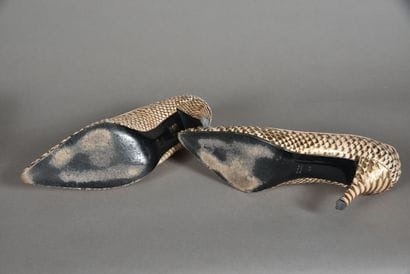 CHARLES JOURDAN. Pair of copper pumps, reptile...