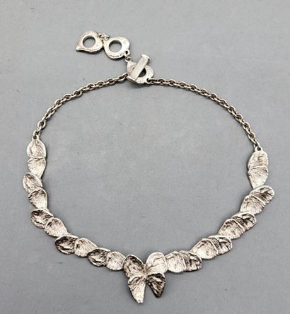 Yves Saint Laurent. Necklace made of hammered...