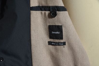 SMALTO. Black polyester raincoat, double...