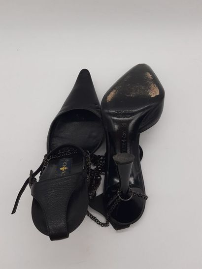 PATRICK COX. Pair of black leather pumps,...