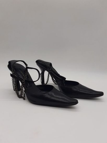 PATRICK COX. Pair of black leather pumps,...