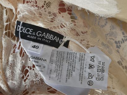 DOLCE & GABBANA. Ivory lace mini dress without...