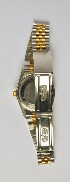ROLEX: Steel and 18K (750/oo) yellow gold...