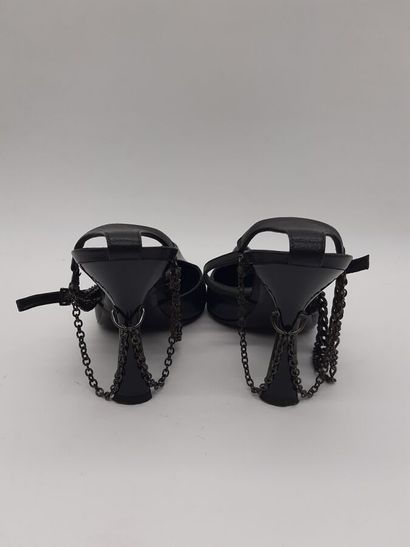 PATRICK COX. Pair of black leather pumps,...