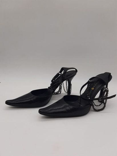 PATRICK COX. Pair of black leather pumps,...