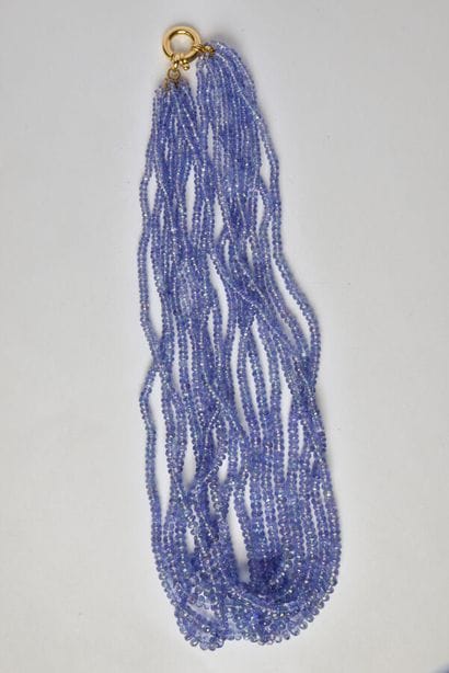 Necklace with 8 rows of small faceted Tanzanite...