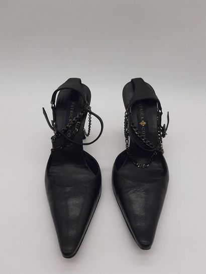 PATRICK COX. Pair of black leather pumps,...
