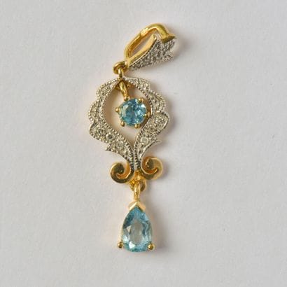 Articulated pendant in 18K (750/oo) gold...