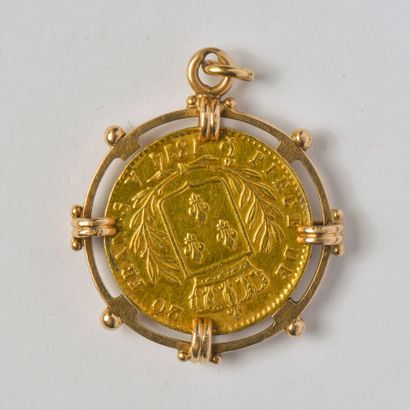 Pendant in 18K yellow gold (750/oo) with...