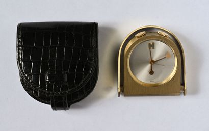 HERMÈS: Travel alarm clock in gilded metal,...