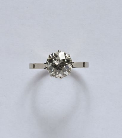 Bague solitaire en or gris 18K (750/oo) et...