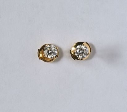 Pair of 18K (750/oo) yellow gold stud earrings...