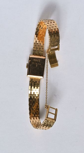 Watch in 18K (750/oo) yellow gold, rectangular...