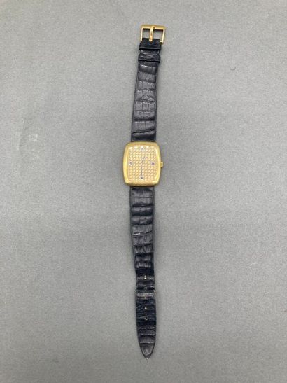 *AUDEMARS PIGUET. Montre tonneau en or jaune,...
