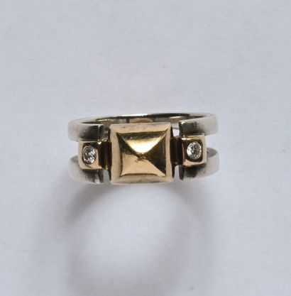 HERMÈS: Ring in silver (800/00) and 18K yellow...