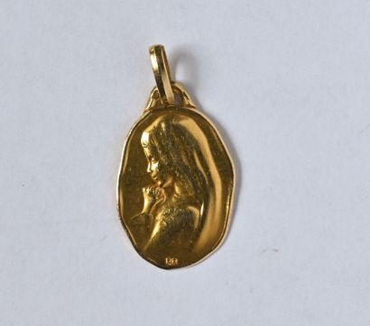 18K (750/oo) yellow gold irregular oval Religious...