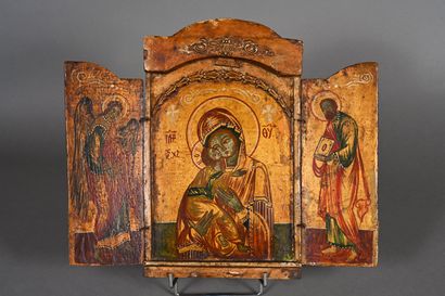Triptyque en bois polychrome et stuc figurant...