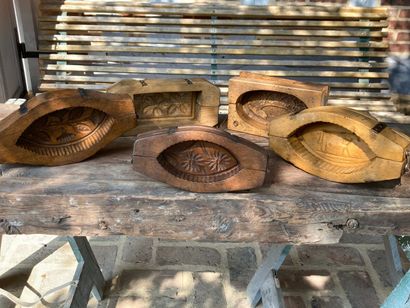 Five beechwood butter molds, decorated with...