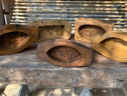 Five beechwood butter molds, decorated with...