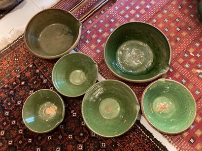 SAVOIE. Six green glazed earthenware tians.
20th...