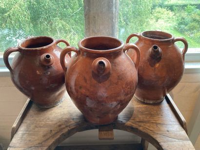 AUVERGNE? Three piriform jugs with triple...