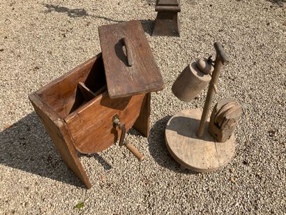 A softwood churn and a wooden machine consisting...